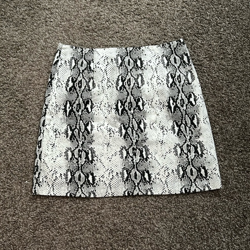 Mini skirt from she + sky in snake print!